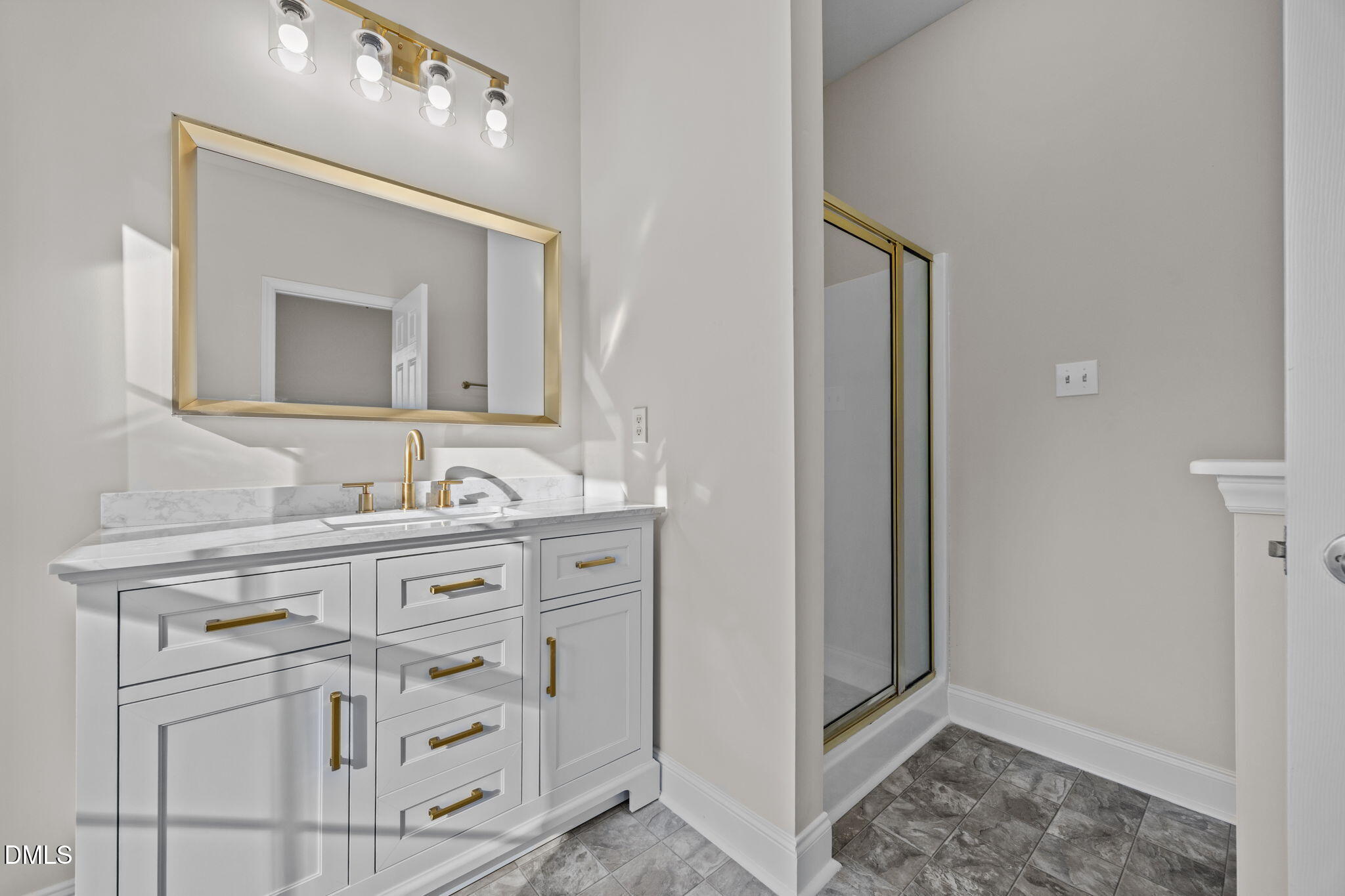 118 Kayleigh Court Willow Spring, NC 27592 - Photo 26 of 37 a bathroom with a sink vanity and mirror