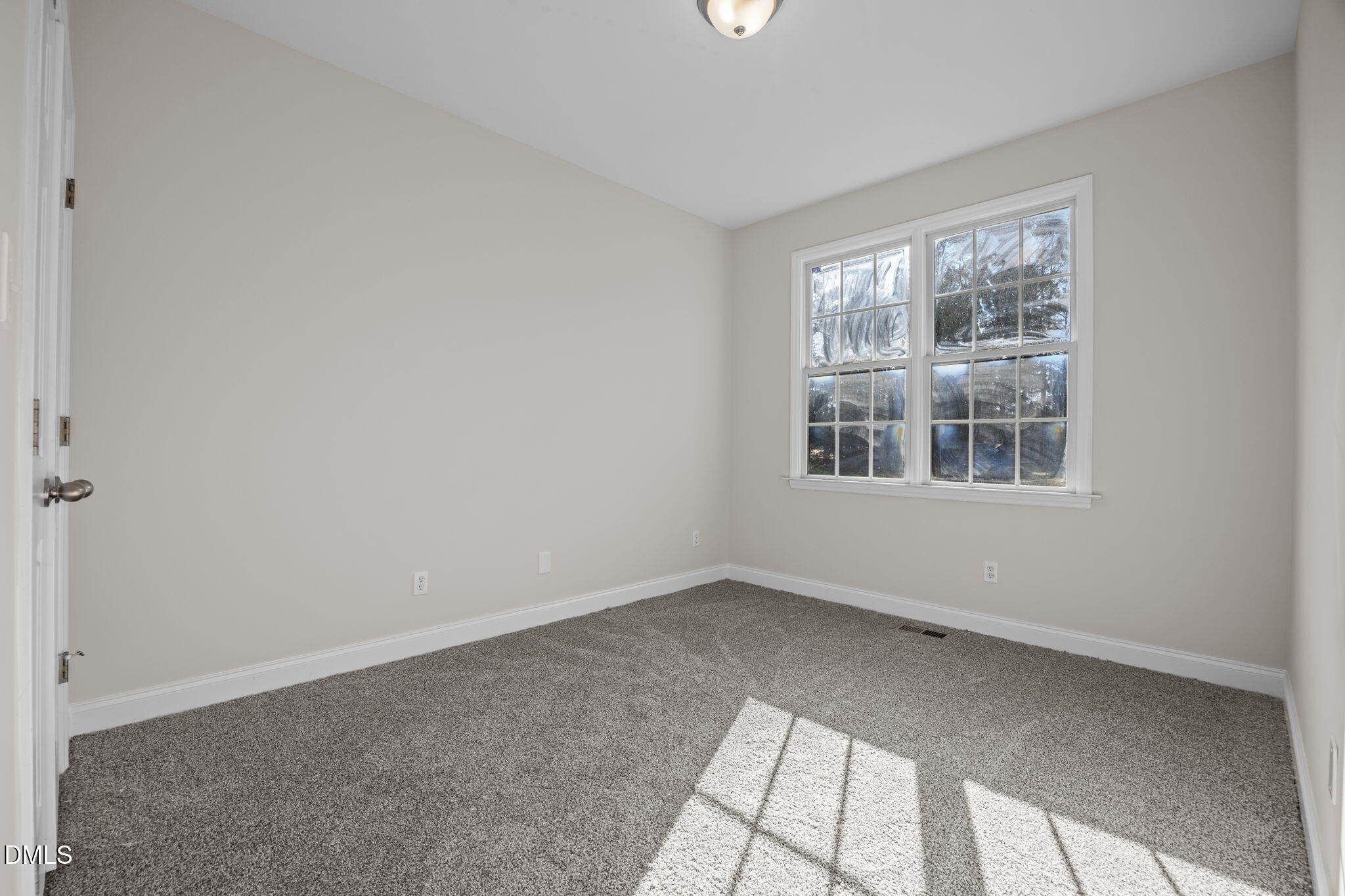 118 Kayleigh Court Willow Spring, NC 27592 - Photo 27 of 37 a view of an empty room with a window