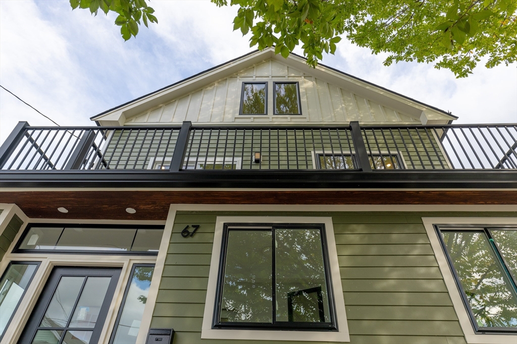 69 Boston Avenue, Unit 69 Somerville, MA 02144 - Photo 26 of 26 a front view of a house with entryway