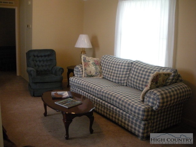 73 Smith Acres Road Ennice, NC 28623 - Photo 19 of 22 a living room with furniture