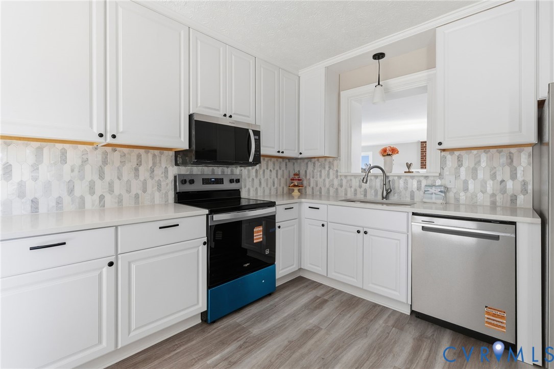 5607 Jahnke Road Richmond, VA 23225 - Photo 13 of 28 Kitchen featuring appliances with stainless steel