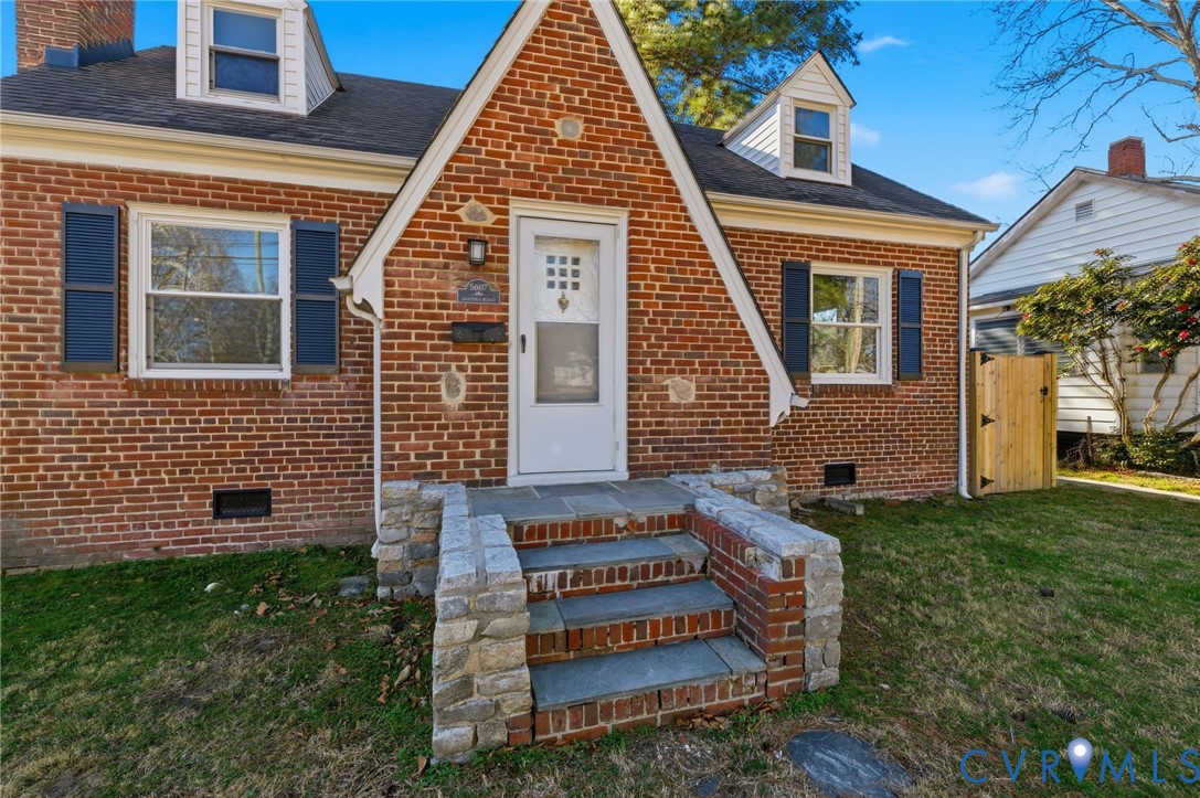 5607 Jahnke Road Richmond, VA 23225 - Photo 2 of 28 View of front of home featuring brick siding, craw
