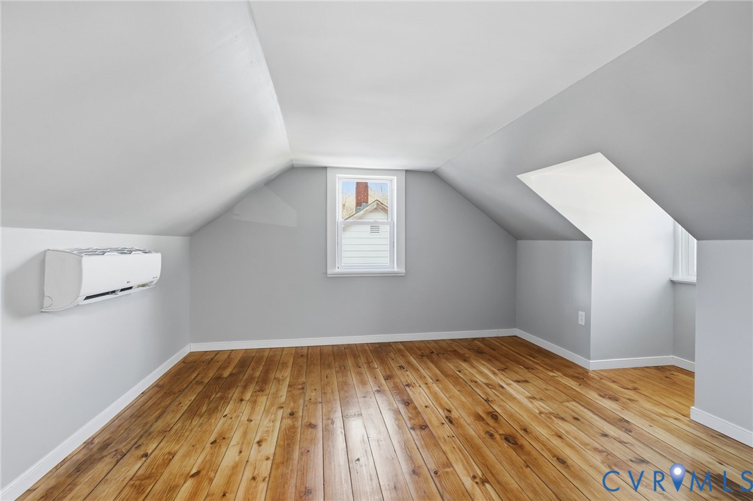 5607 Jahnke Road Richmond, VA 23225 - Photo 23 of 28 Additional living space featuring light wood-style