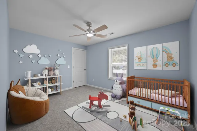 a living room with furniture a rug and a window