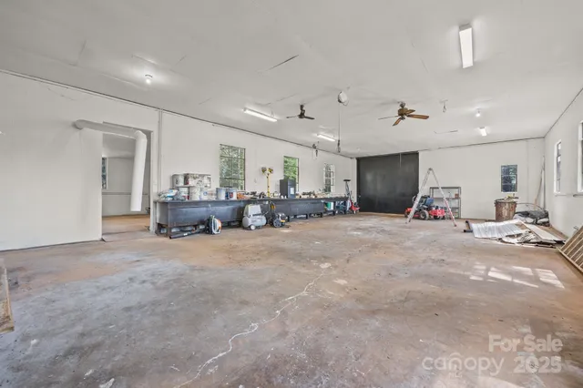 a room with furniture and a large window