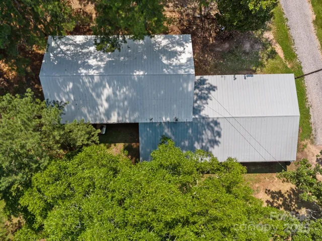 a view of a garden with a fountain