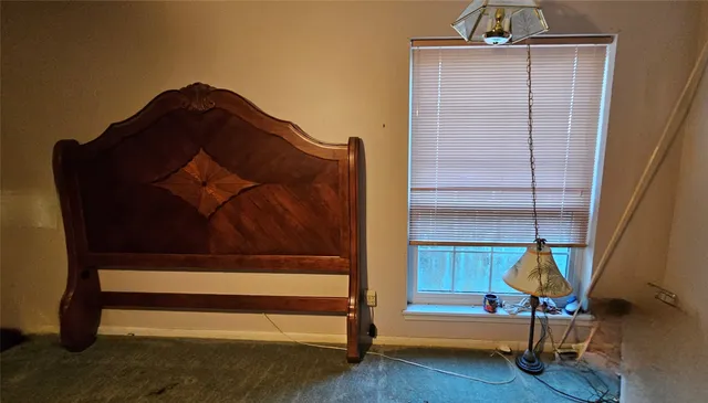 a bedroom with a bunk bed and a dresser