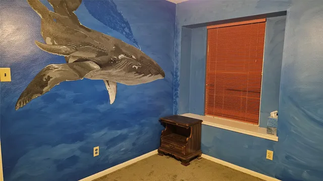 a view of a room with a window