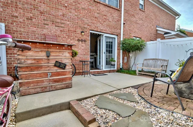a backyard of a house with seating space