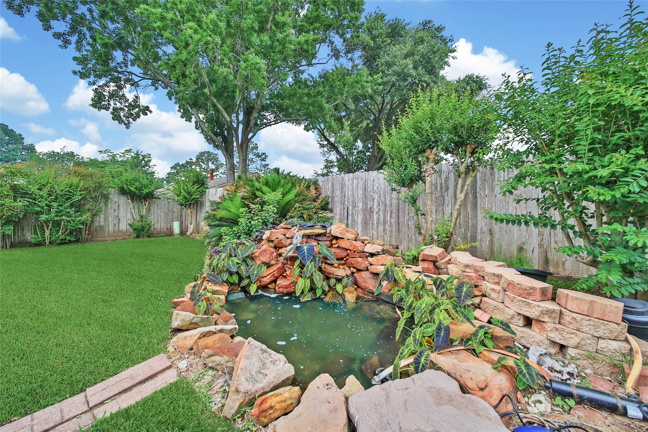 5010 Cupids Bower Court Spring, TX 77388 - Photo 35 of 40 a view of a backyard with garden