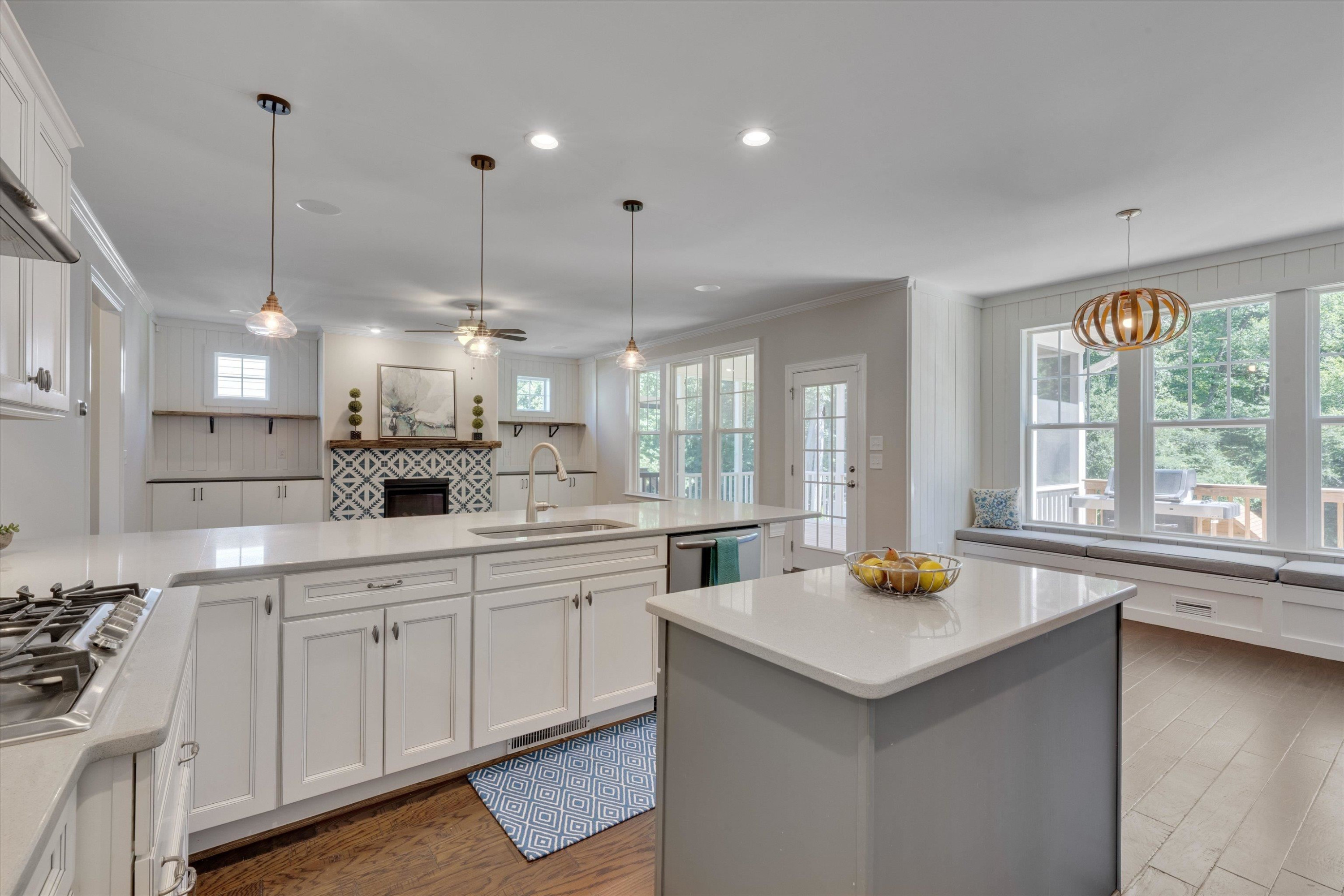 2617 Needle Pine Drive Apex, NC 27539 - Photo 13 of 42 a kitchen with a sink a window and chairs