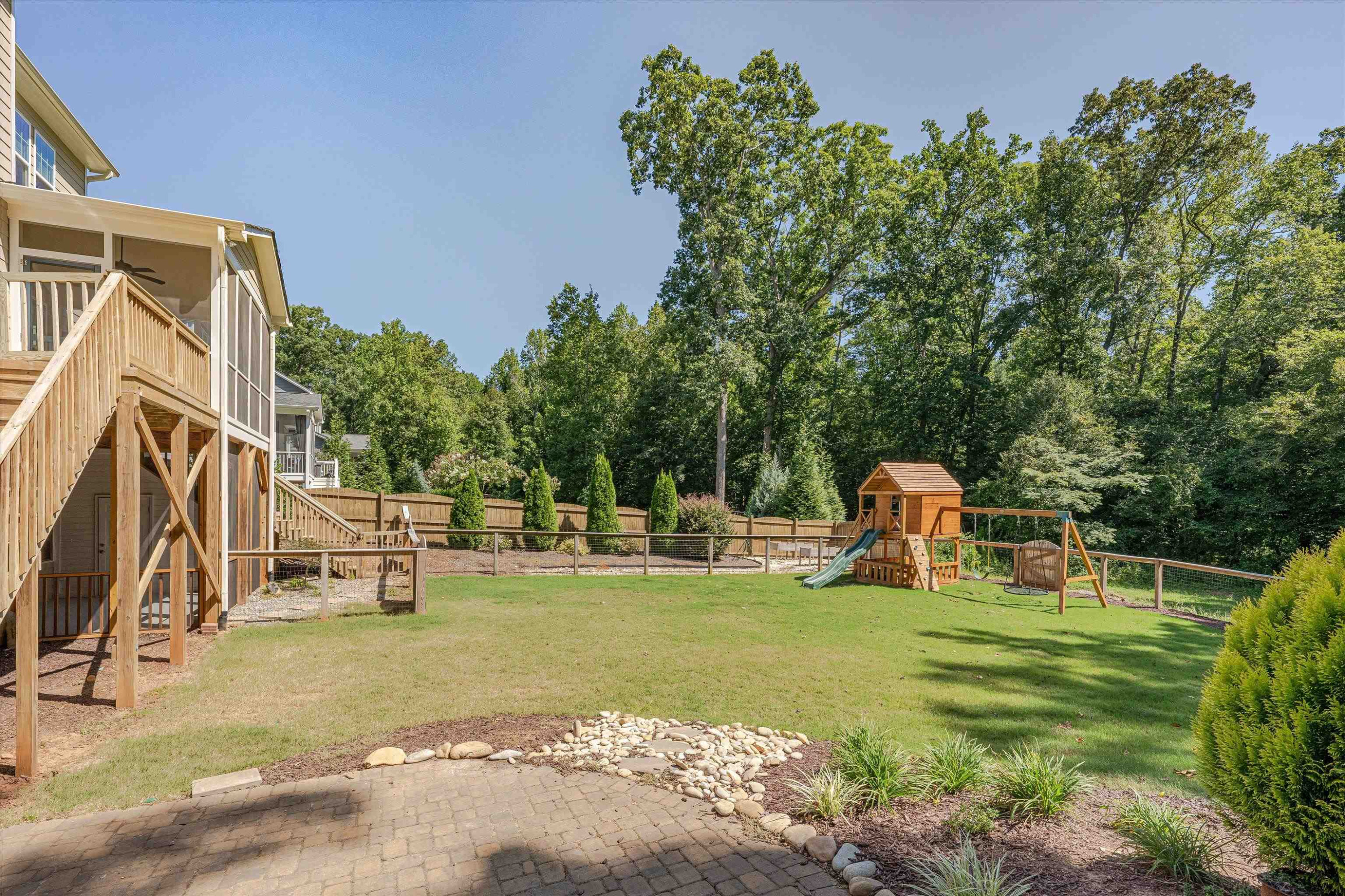 2617 Needle Pine Drive Apex, NC 27539 - Photo 36 of 42 a view of a house with backyard and sitting area