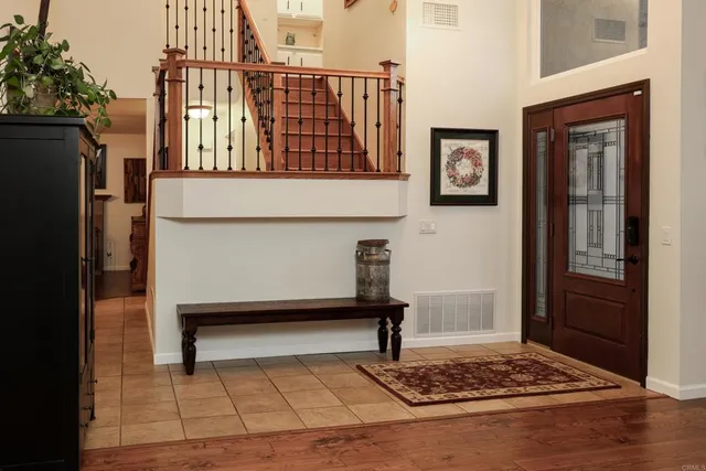 a bathroom with a sink vanity and a mirror