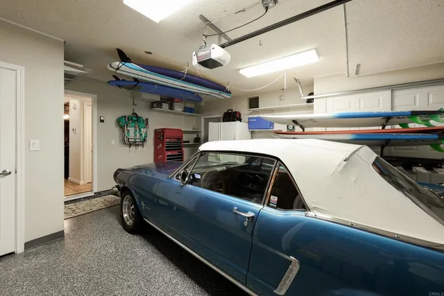 a dining room with a table and chairs