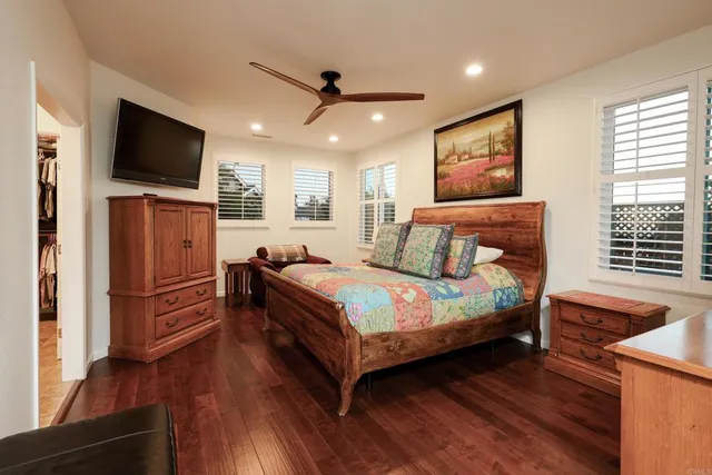 a view of a chairs and table in backyard of the house