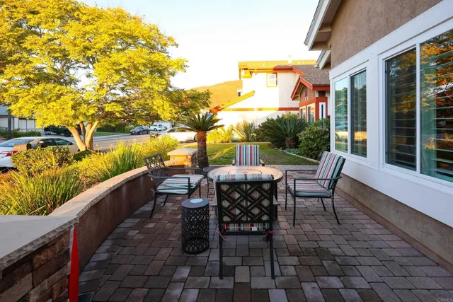 a view of a chair and table on the terrace