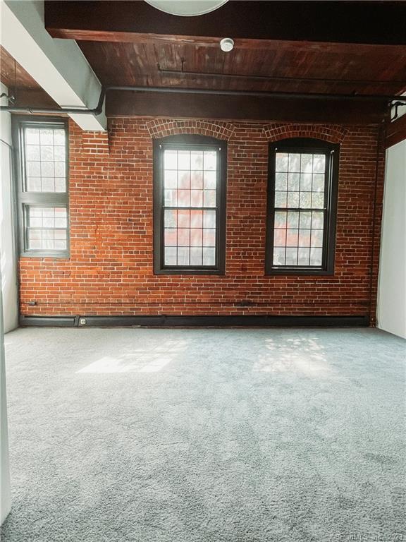 74 Union Place, Unit 209 Hartford, CT 06103 - Photo 1 of 1 a view of an empty room with a window