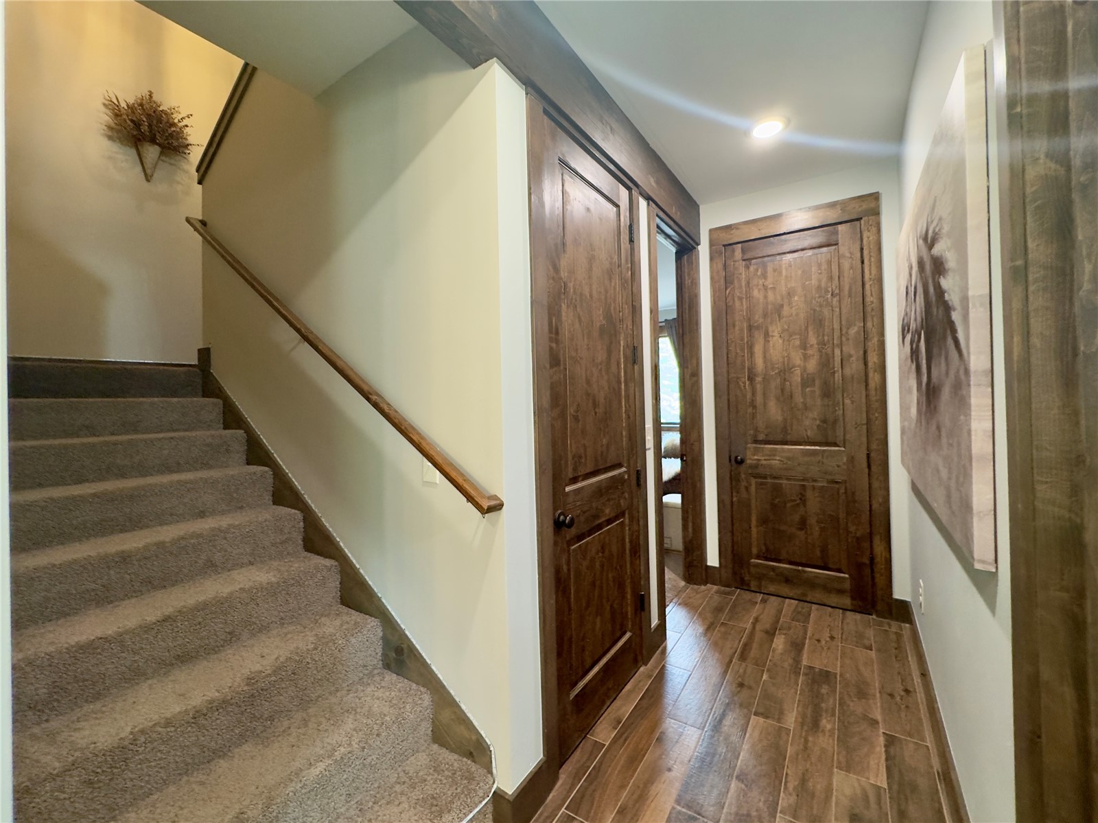 102 Lake Ridge Circle, Unit 1893 Keystone, CO 80435 - Photo 19 of 49 To the left - upstairs. Closed left door is laundry. Open Door is Main Level Bed 1. Bath is door to the right before picture.