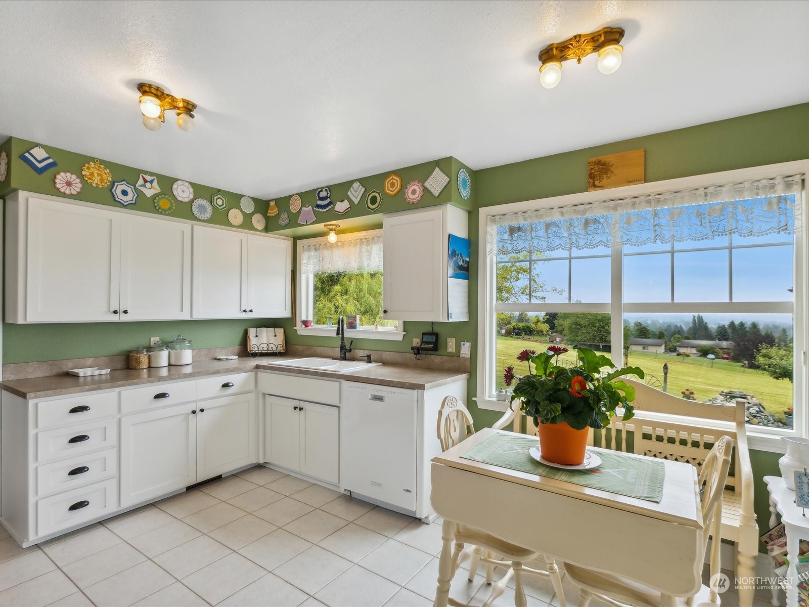 2625 Mountain View Road Ferndale, WA 98248 - Photo 23 of 40 a kitchen with a sink cabinets and window