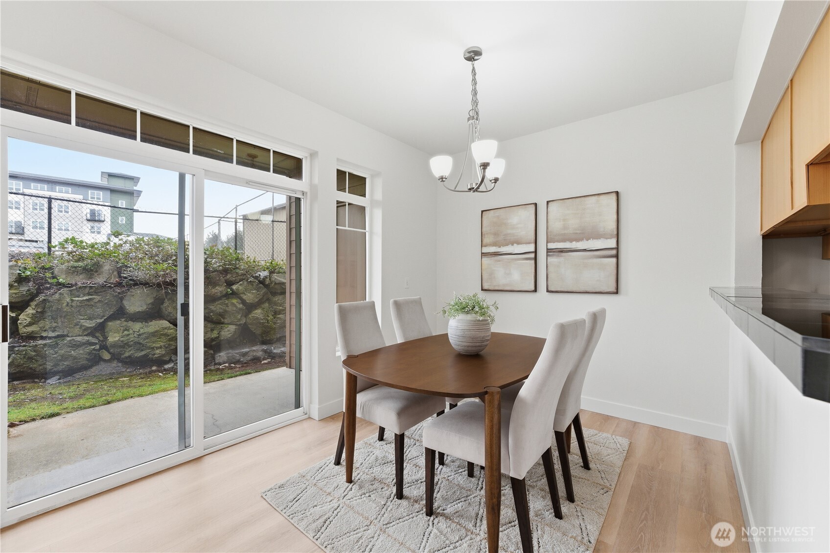 18930 Bothell Everett Highway, Unit G105 Bothell, WA 98012 - Photo 12 of 21 a view of a dining room with furniture window and outside view
