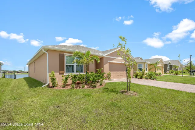 a house view with a garden space