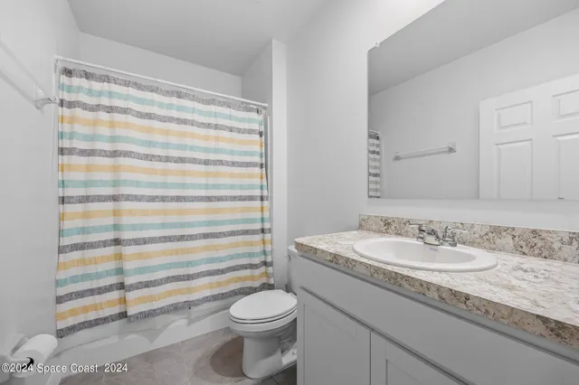 a view of a bathroom with a shower