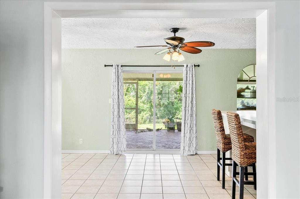1302 Georgetowne Circle Sarasota, FL 34232 - Photo 7 of 28 a view of an entryway with a chandelier