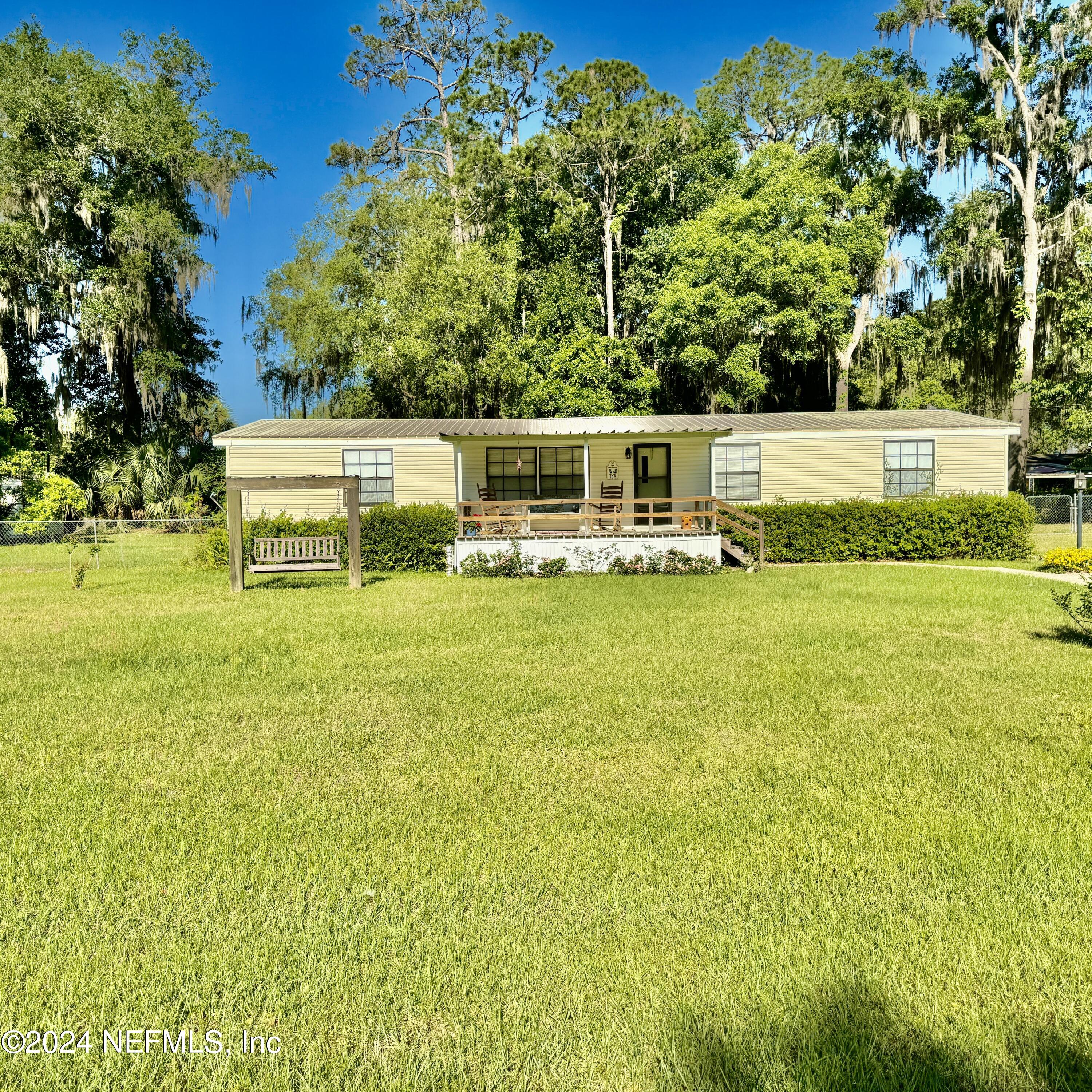 105 George Avenue Interlachen, FL 32148 - Photo 3 of 29 a view of a house with a yard