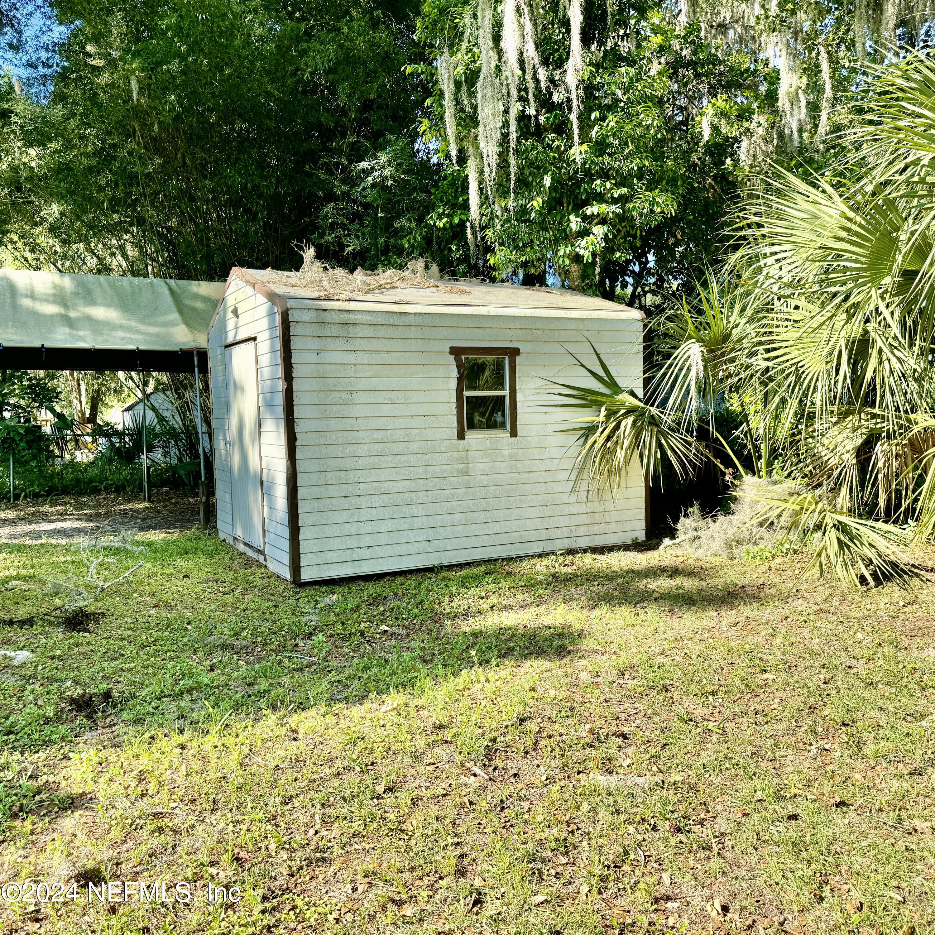 105 George Avenue Interlachen, FL 32148 - Photo 7 of 29 a view of a backyard