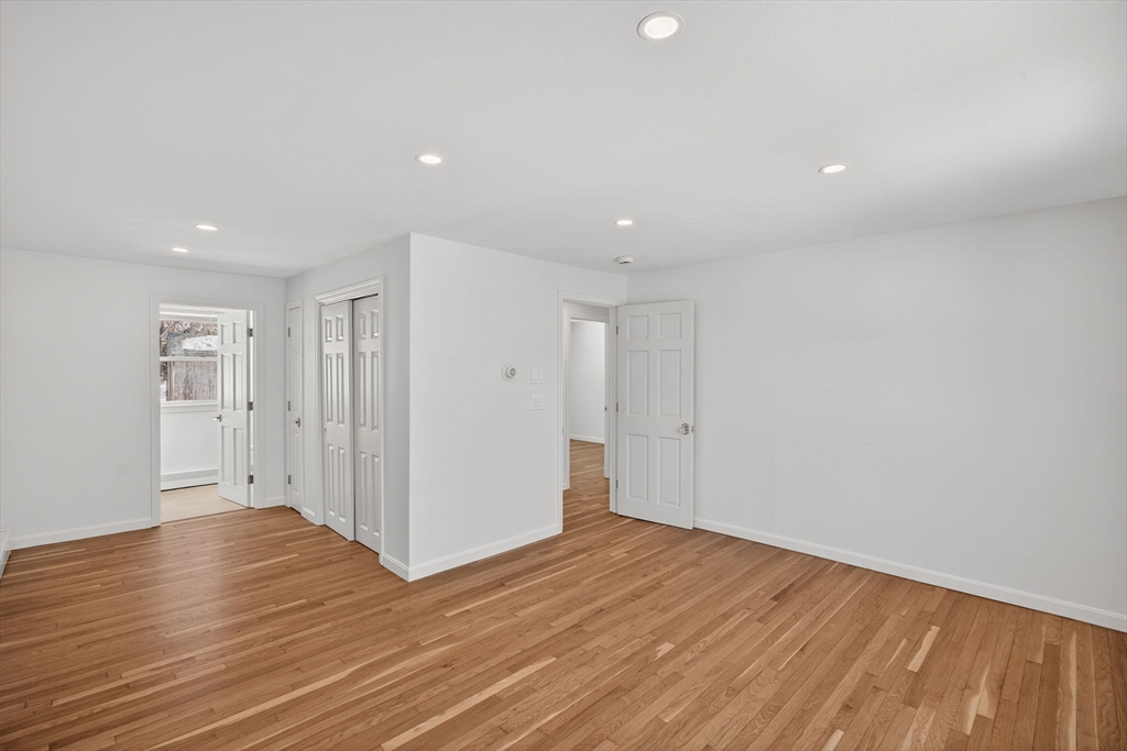 585 Old Falmouth Road Barnstable, MA 02648 - Photo 17 of 40 a view of empty room with wooden floor