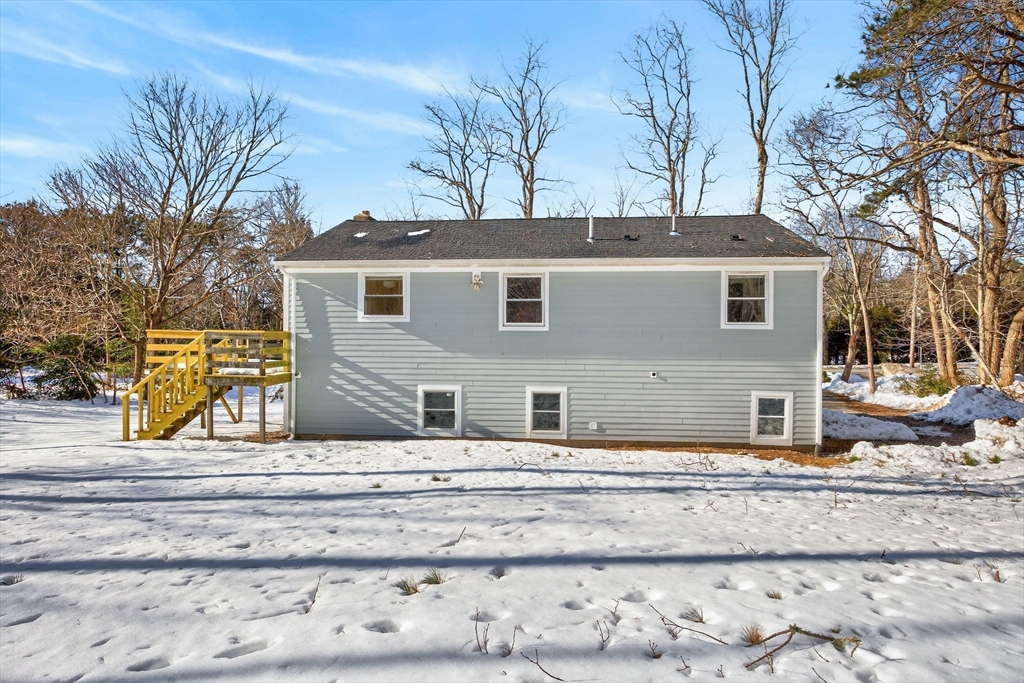 585 Old Falmouth Road Barnstable, MA 02648 - Photo 3 of 40 a house view with a outdoor space