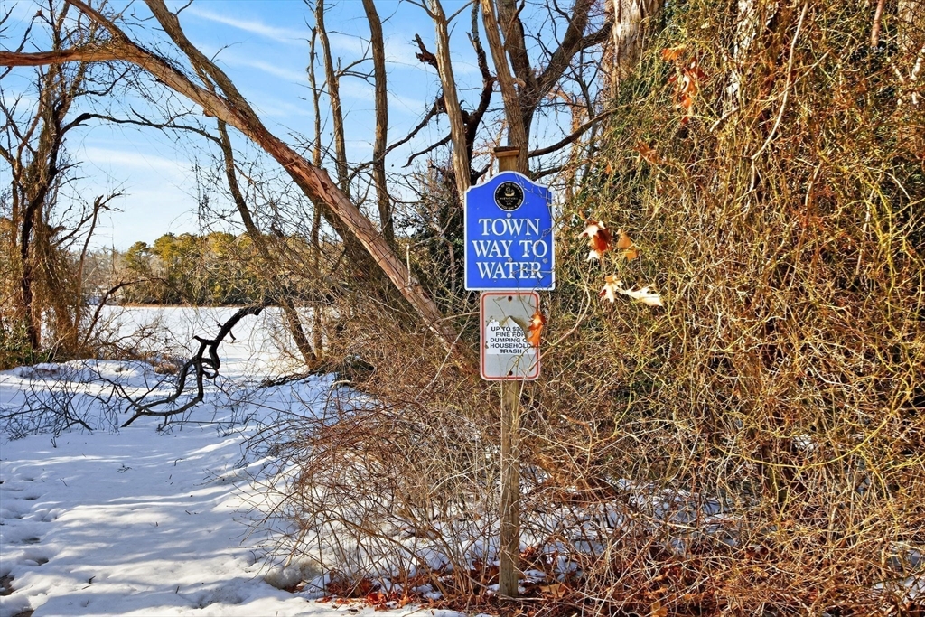 585 Old Falmouth Road Barnstable, MA 02648 - Photo 7 of 40 a street sign on a pole