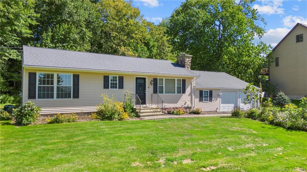 1054 Andrew Mountain Road Naugatuck, CT 06770 - Photo 1 of 1 a front view of house with yard and green space