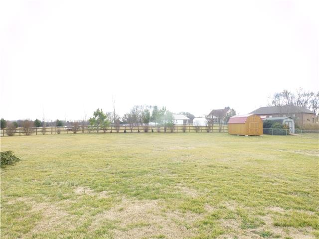 5501 Hunters Point Pike Lebanon, TN 37087 - Photo 14 of 14 Huge 1.57 acre level cleared fenced lot --- view of the back of the lot -- front yard just as big!