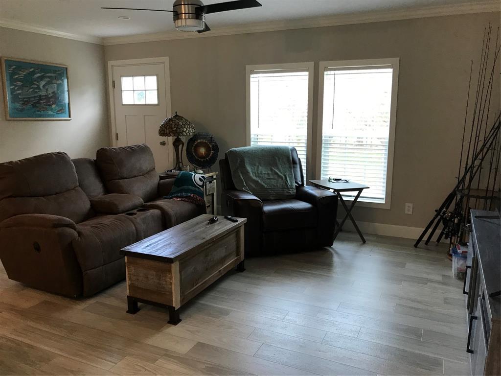 19418 Northwest 246th Street Okeechobee, FL 34972 - Photo 6 of 24 a living room with furniture and a window