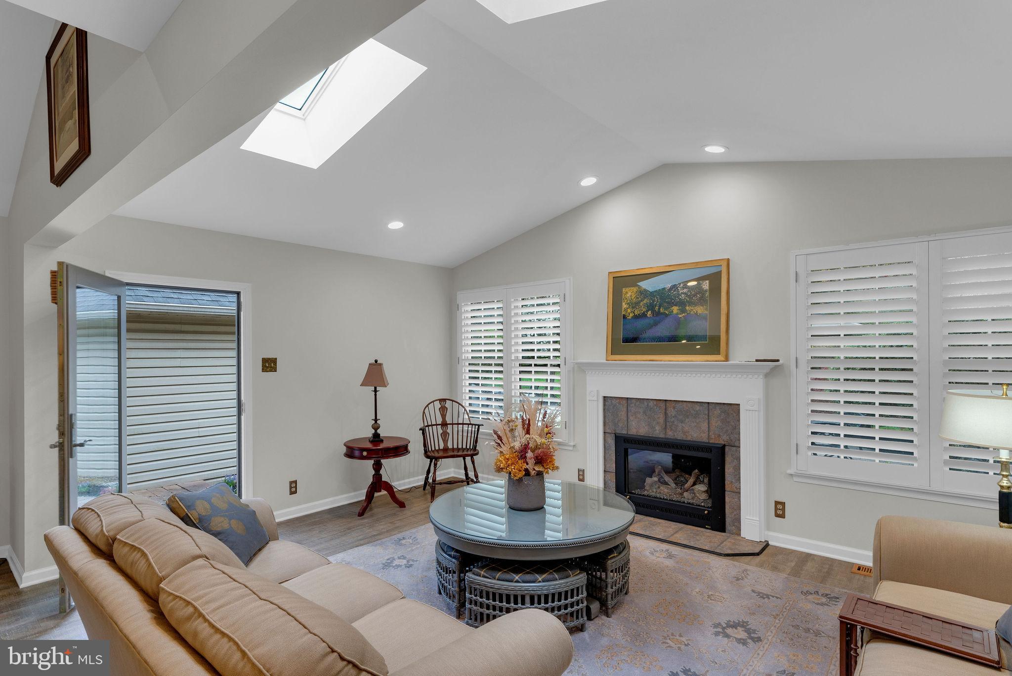 54 John Dyer Way Doylestown, PA 18902 - Photo 14 of 61 a living room with furniture a fireplace and a large window