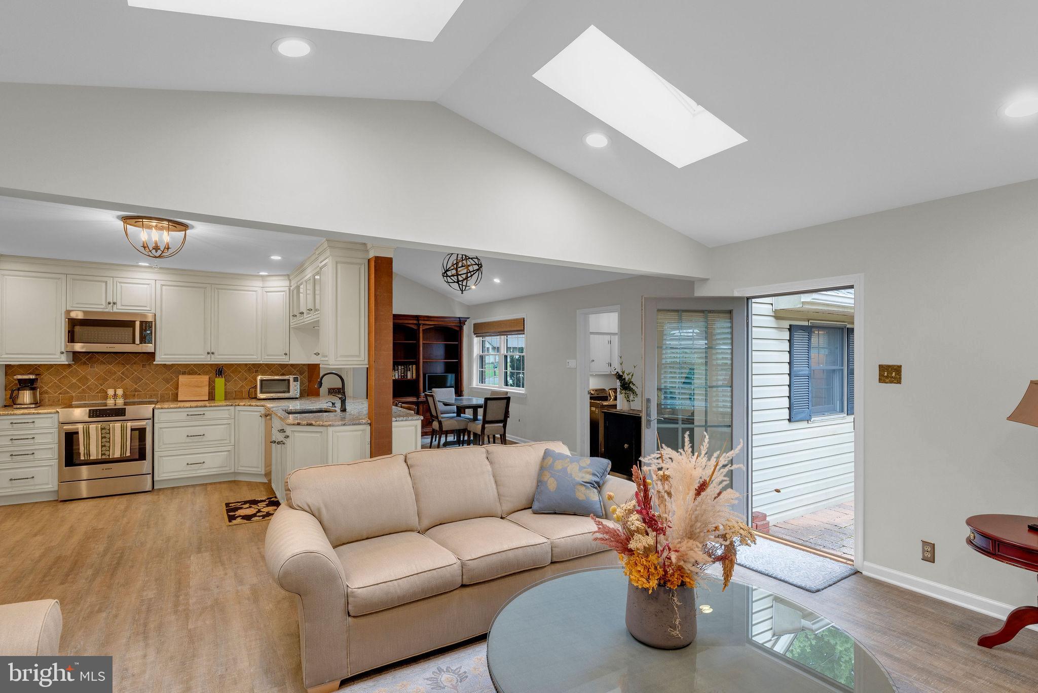 54 John Dyer Way Doylestown, PA 18902 - Photo 16 of 61 a living room with furniture and kitchen view