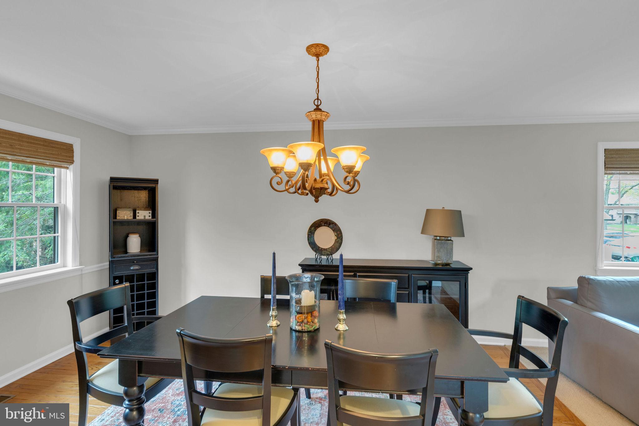 54 John Dyer Way Doylestown, PA 18902 - Photo 18 of 61 a view of a dining room with furniture and chandelier