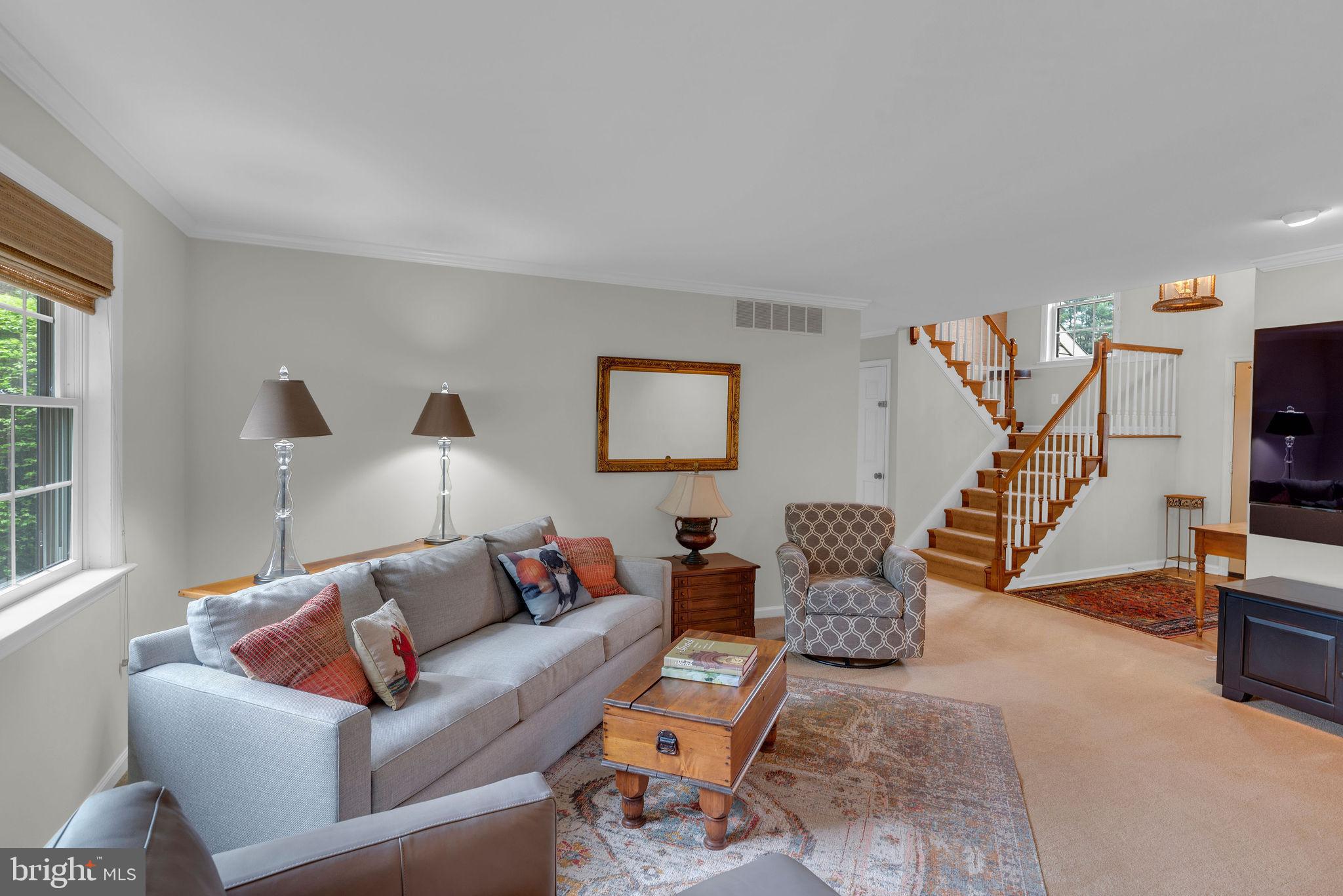 54 John Dyer Way Doylestown, PA 18902 - Photo 21 of 61 a living room with furniture and a flat screen tv