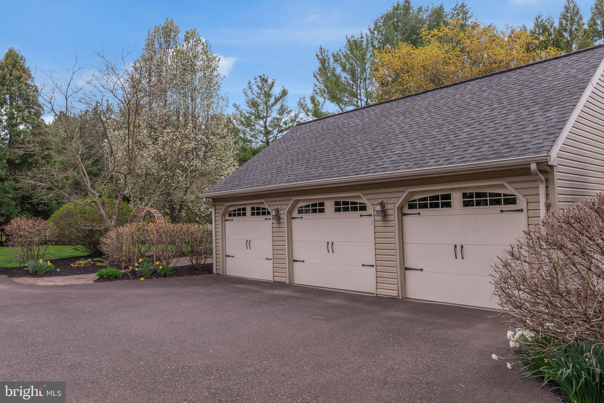 54 John Dyer Way Doylestown, PA 18902 - Photo 60 of 61 a view of a white house with a yard and garage