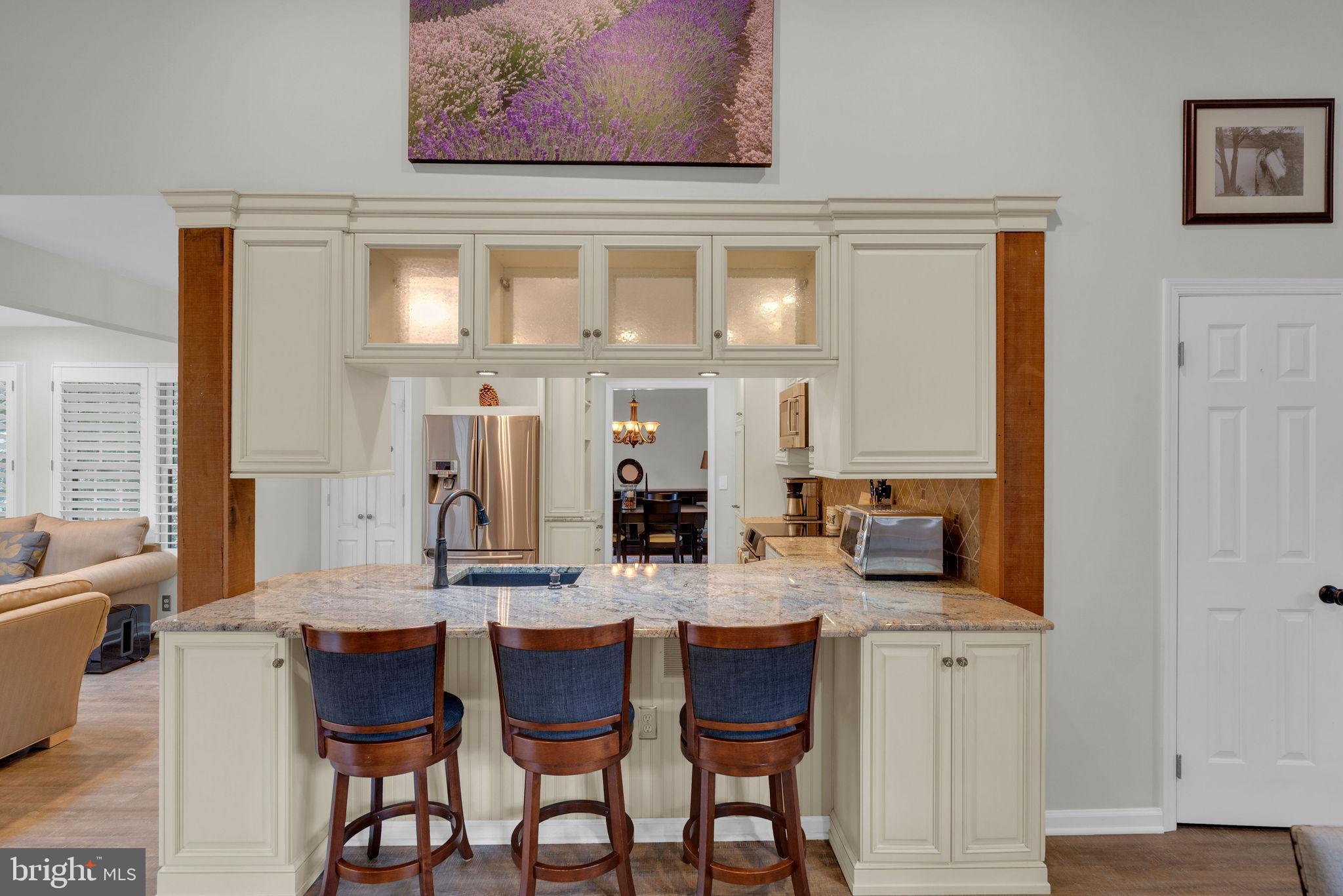 54 John Dyer Way Doylestown, PA 18902 - Photo 9 of 61 a view of a dining room with furniture and chandelier