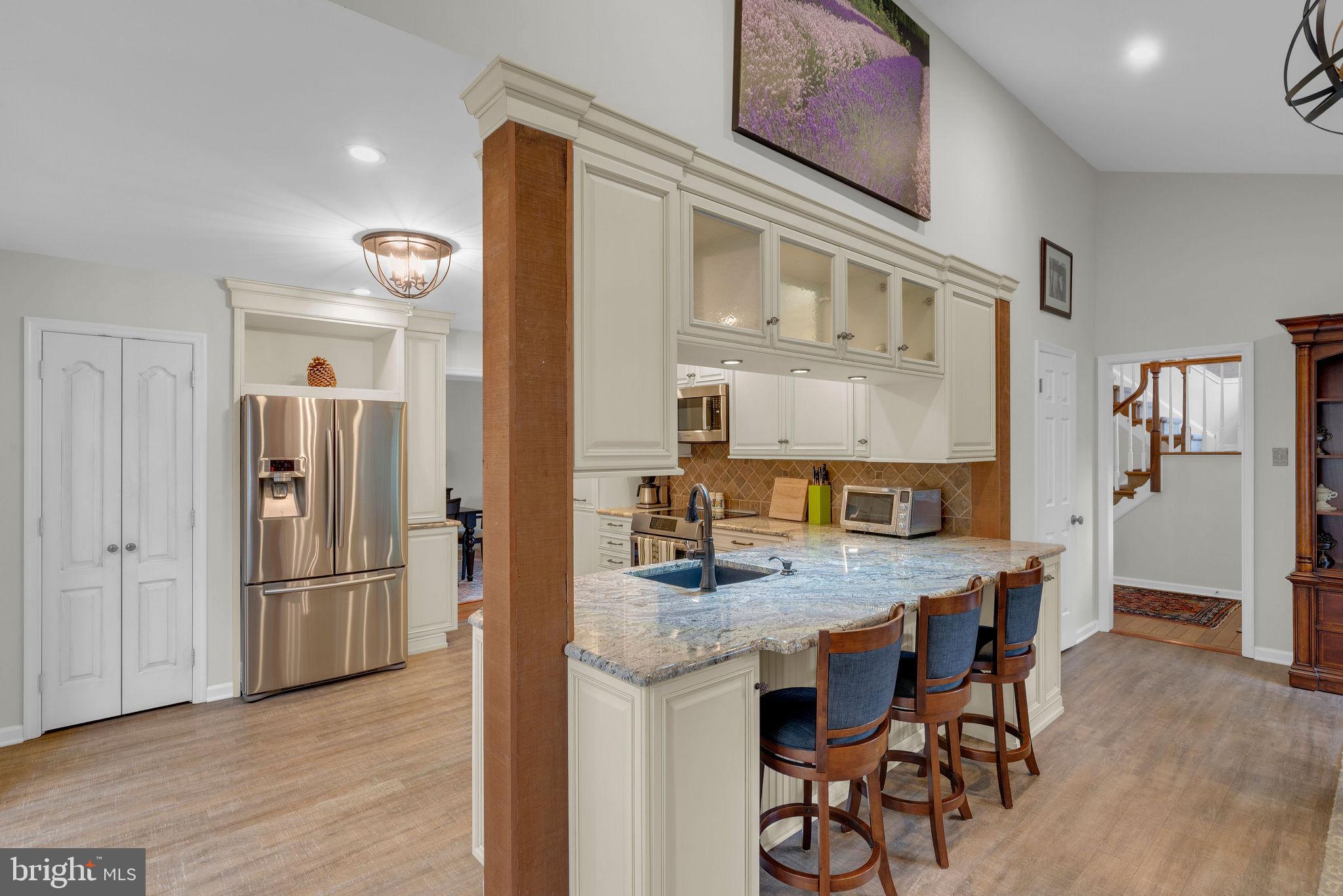 54 John Dyer Way Doylestown, PA 18902 - Photo 10 of 61 a kitchen with stainless steel appliances granite countertop furniture and a refrigerator