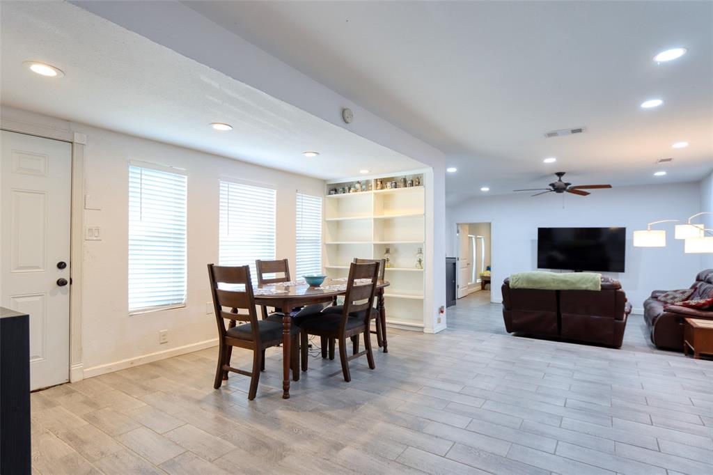305 East Belt Line Road Wilmer, TX 75172 - Photo 13 of 16 a view of a dining room with furniture window and wooden floor
