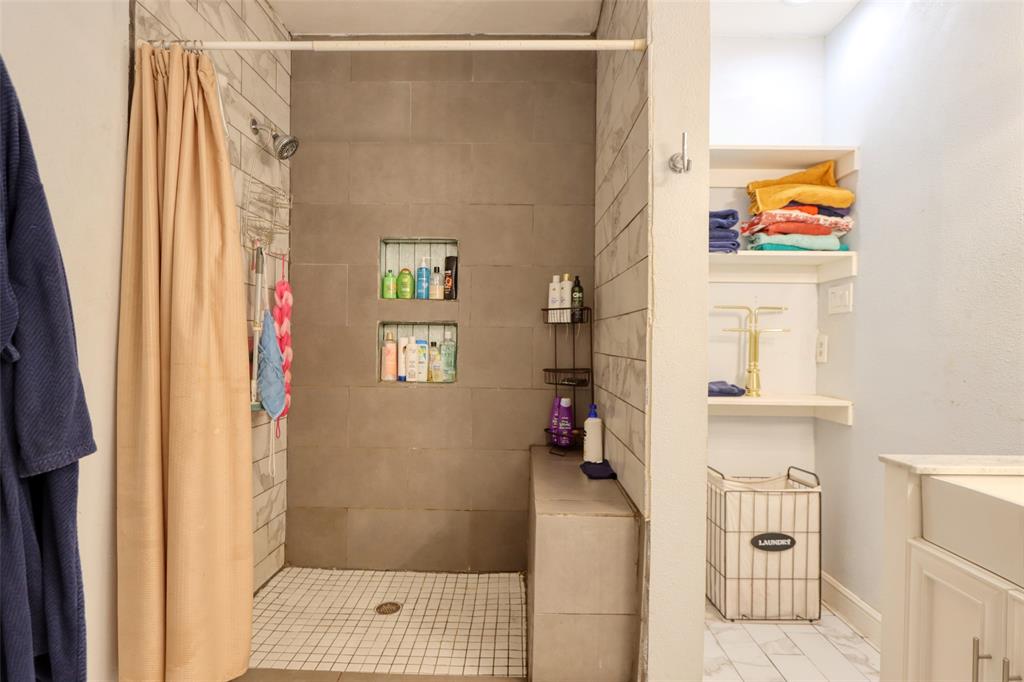 305 East Belt Line Road Wilmer, TX 75172 - Photo 14 of 16 a picture of a bathroom