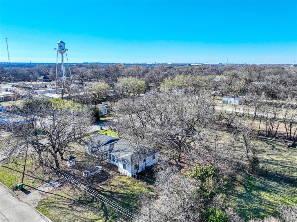 305 East Belt Line Road Wilmer, TX 75172 - Photo 16 of 16 an aerial view of a house with a yard