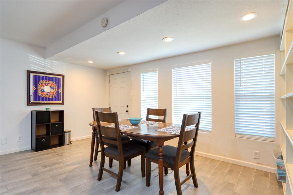305 East Belt Line Road Wilmer, TX 75172 - Photo 4 of 16 a view of a dining room with furniture