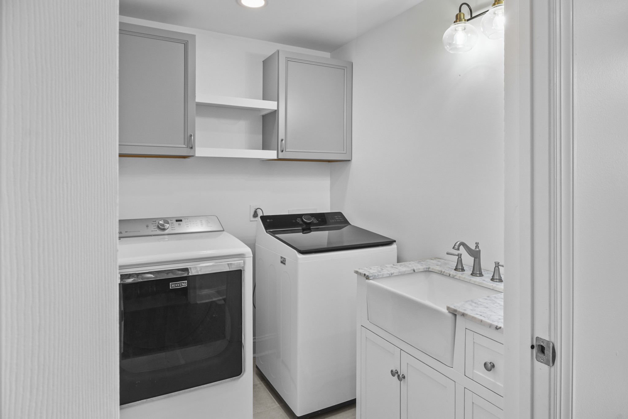20 Zinker Road Lawrenceburg, TN 38464 - Photo 16 of 39 a utility room with sink dryer and washer