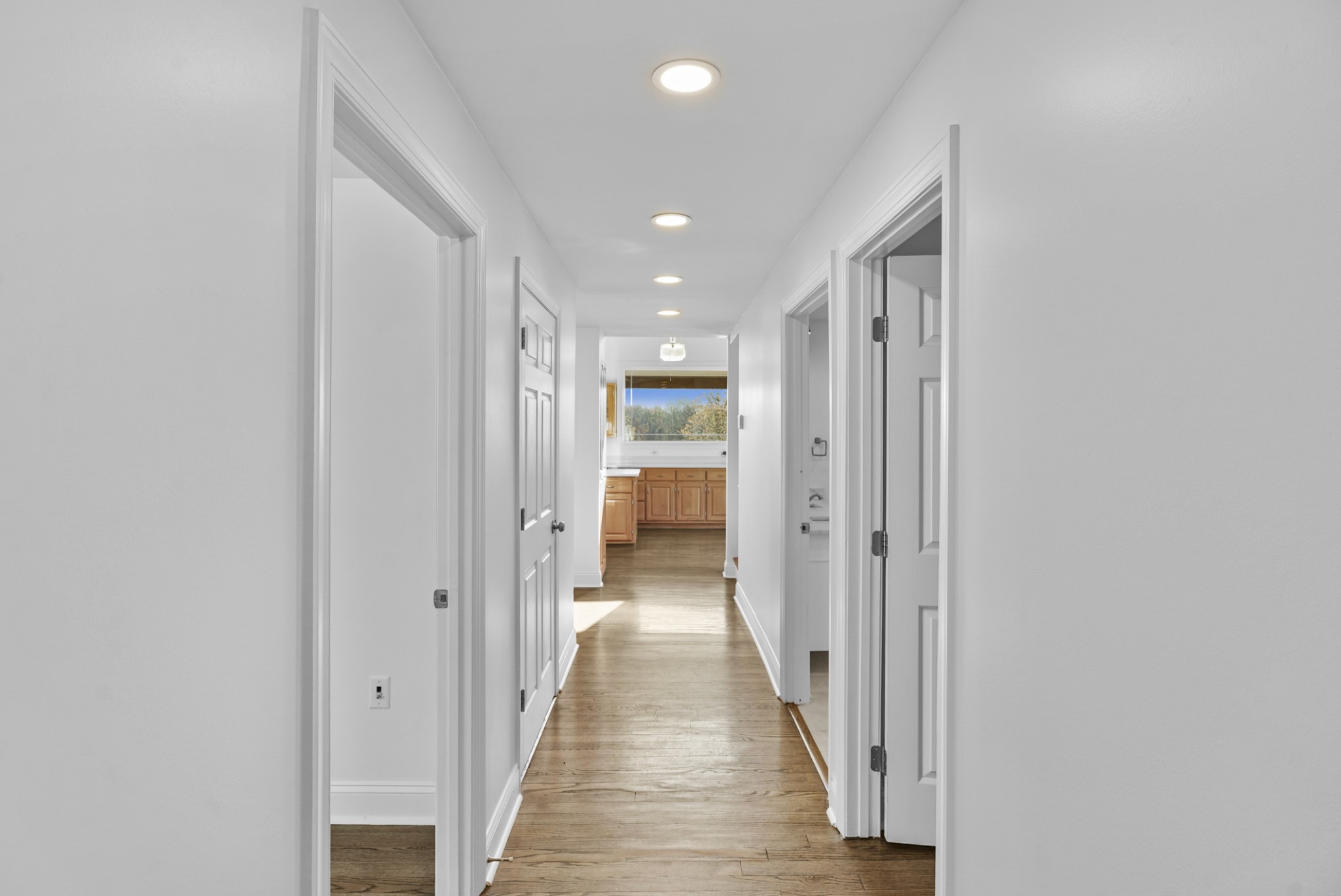 20 Zinker Road Lawrenceburg, TN 38464 - Photo 17 of 39 a view of a hallway with wooden floor and a bathroom
