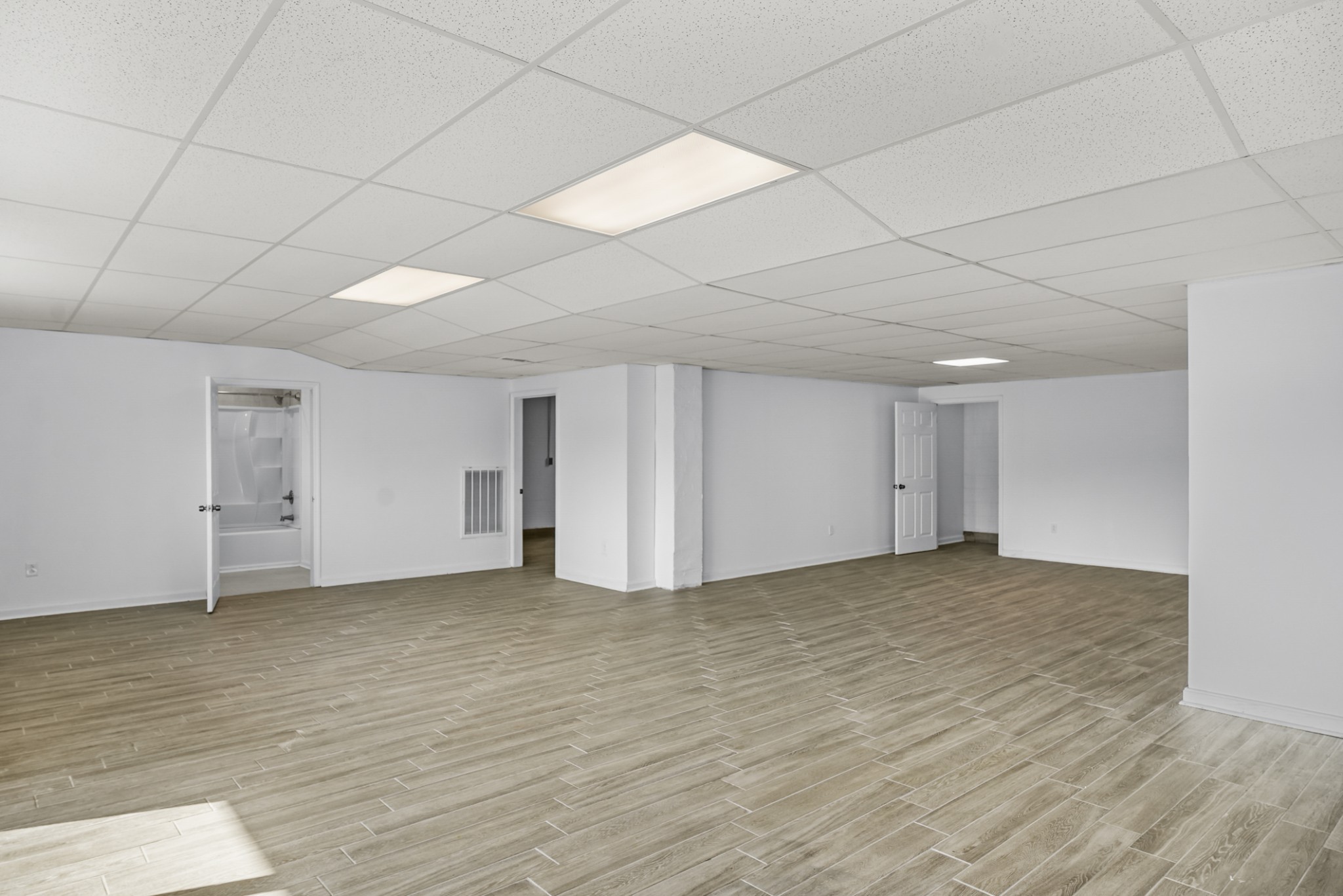 20 Zinker Road Lawrenceburg, TN 38464 - Photo 22 of 39 a view of an empty room with wooden floor