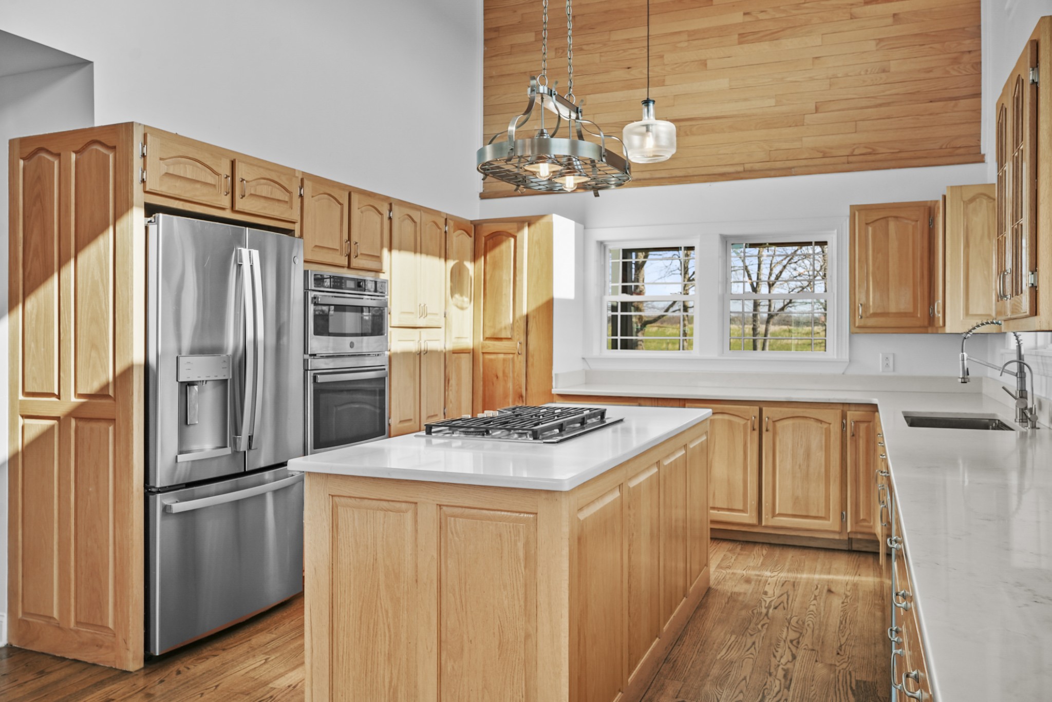 20 Zinker Road Lawrenceburg, TN 38464 - Photo 3 of 39 a kitchen with stainless steel appliances granite countertop a sink and a refrigerator